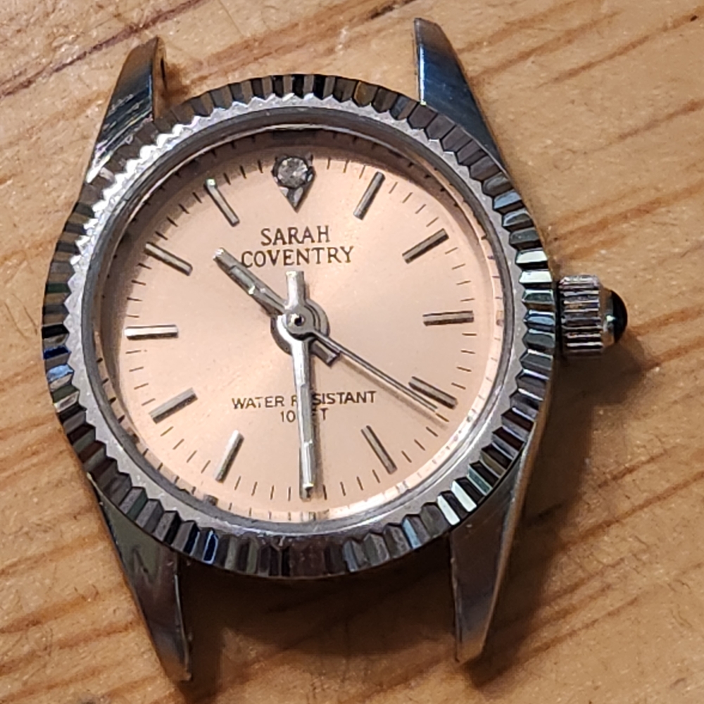 Sarah Coventry Silver and Pink Watch Face